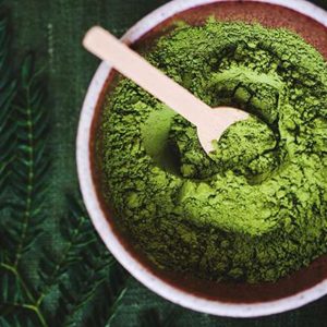 Green Riau Kratom Powder in Bowl with Spoon