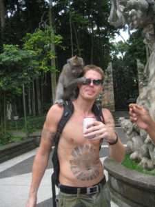 Derek with monkey on shoulders